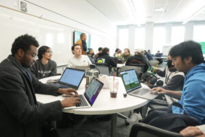 Computer Science students program and race robotic cars